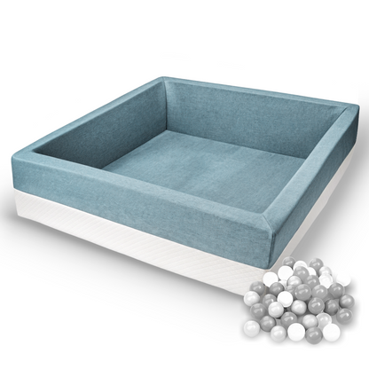 Kind spielt im grauen Bällebad 110×110×40 cm – Rainbow Kids
